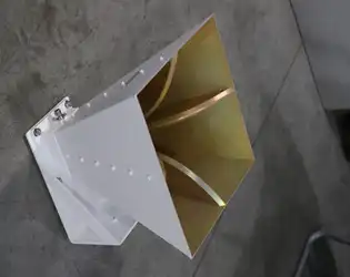 Open Boundary Dual Linear Polarization Four Ridged Horn Antenna:Design Innovation and Performance Edge